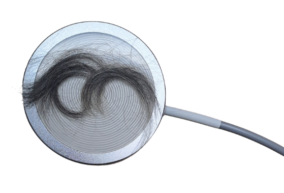 Hair witness placed on the Biostar Q-Cup